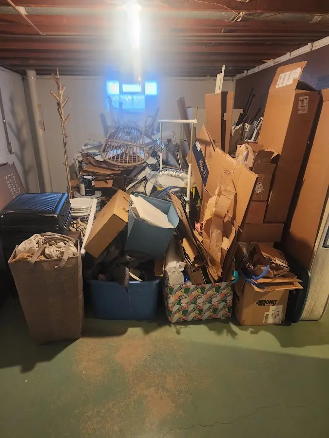 Roll-off dumpster container at job site for 6 Yard Dumpster Rental in Fort Kent